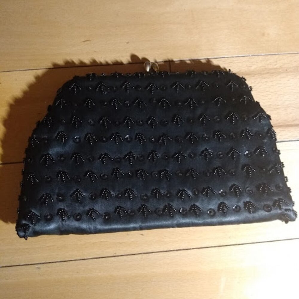 Elegant special occasion black sequence beaded purse.